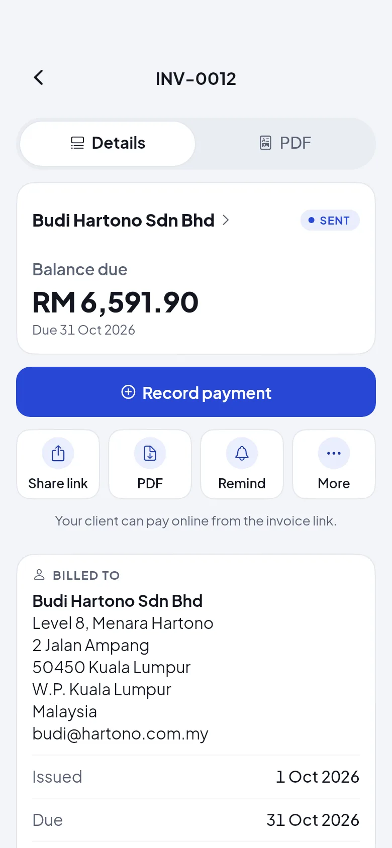 A sent invoice with the note that the client can pay online from the invoice link.